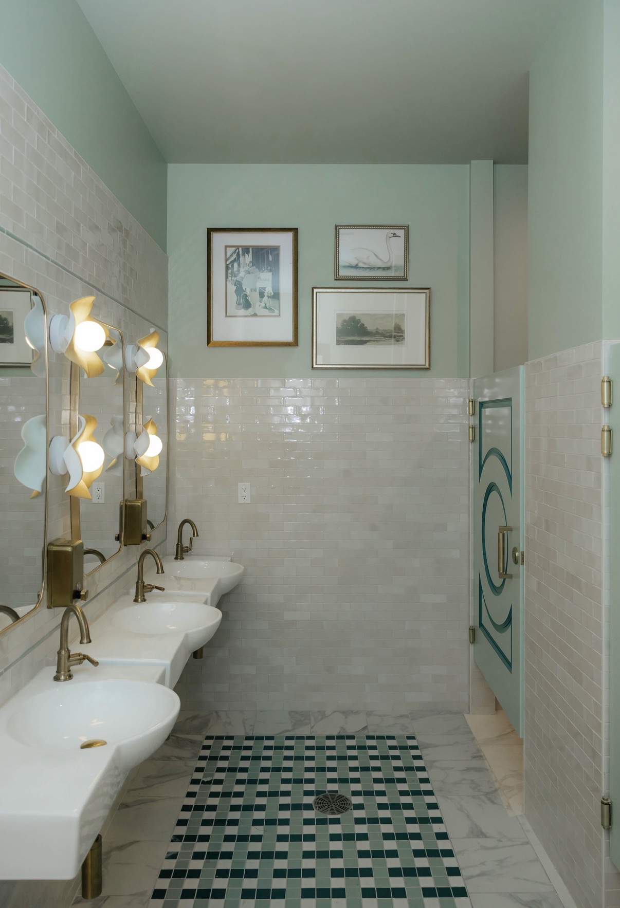 Tiled restroom at The Lobby Suites salon suites